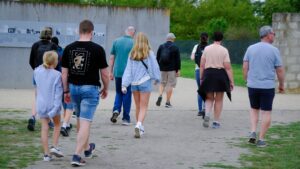 Visitors walking through Sachsenhausen Concentration Camp Memorial