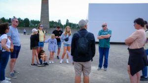 Visitors walking through Sachsenhausen Concentration Camp Memorial